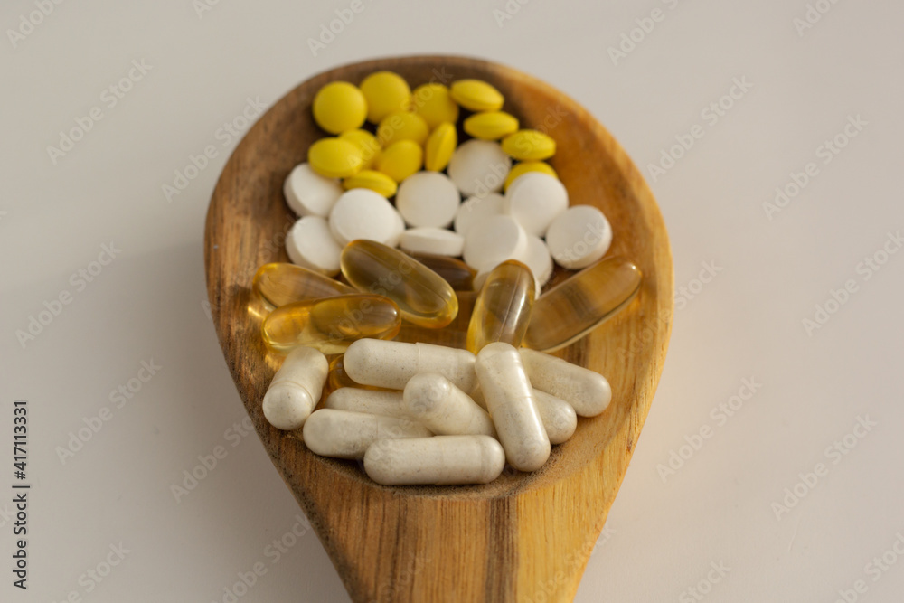 Closeup of supplements for immune system: zinc, vitamin C, probiotic and vitamin D. Closeup of supplements for immune system: zinc, vitamin C, probiotic and vitamin D.