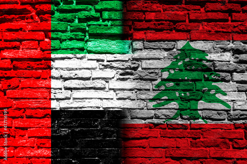 Flag of United Arab Emirates and Lebanon on brick wall Flag of United Arab Emirates and Lebanon on brick wall