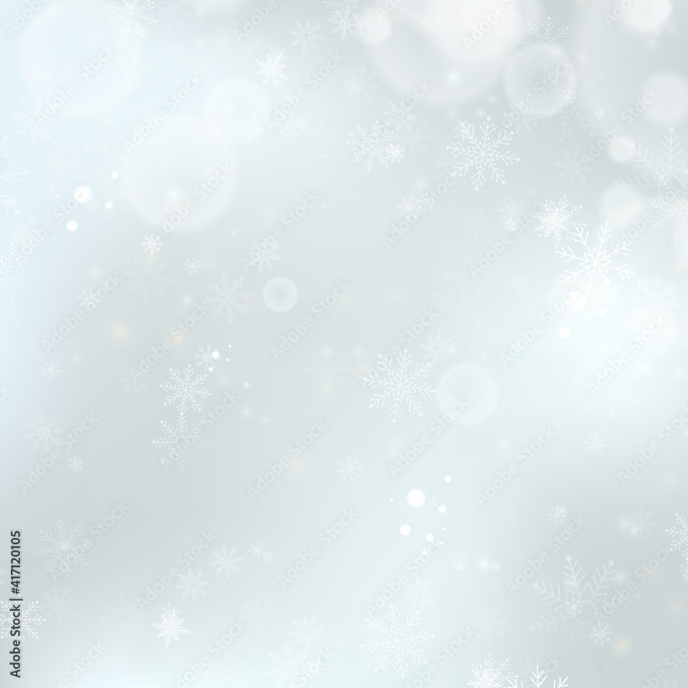 Blurred Christmas silver background with snowflakes