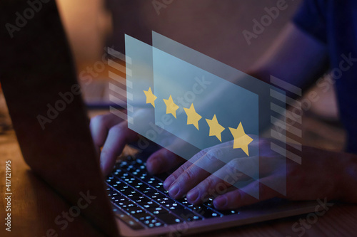 writing review on internet with 5 star rating, reputation management concept photo