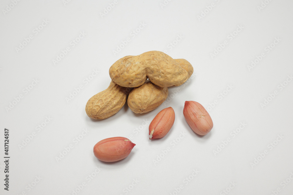 delicious dried peanuts on a white background