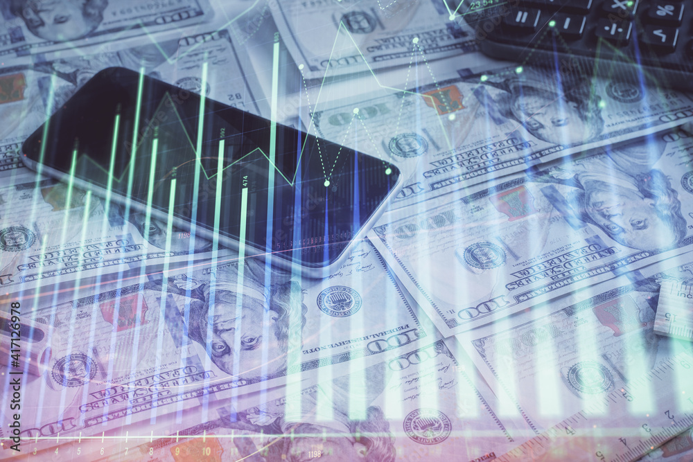 Naklejka premium Double exposure of forex graph drawing over us dollars bill background. Concept of financial markets.