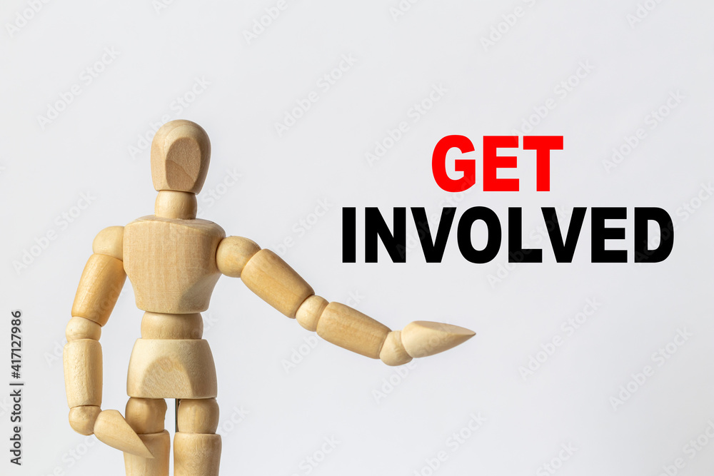 GET INVOLVED. Portrait wooden figure isolated on white background. Business, technology, internet concept. Stock Image GET INVOLVED. Portrait wooden figure isolated on white background. Business, technology, internet concept. Stock Image