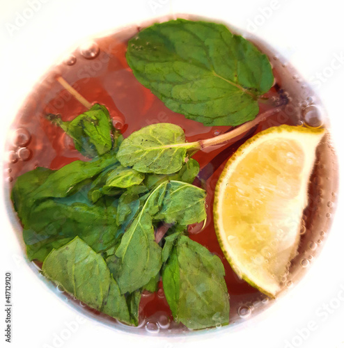 Alcoholic drink cola, rum, mint, lime