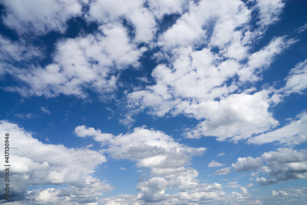 Bright cumulus clouds against a blue sky. Bright cumulus clouds against a blue sky.