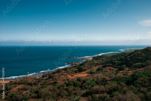 Panoramic view of the blue sea from a mountain top