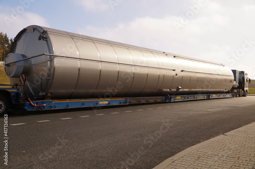 Long vehicle. Oversize load or exceptional convoy. A truck with a special semi-trailer for transporting oversized loads.