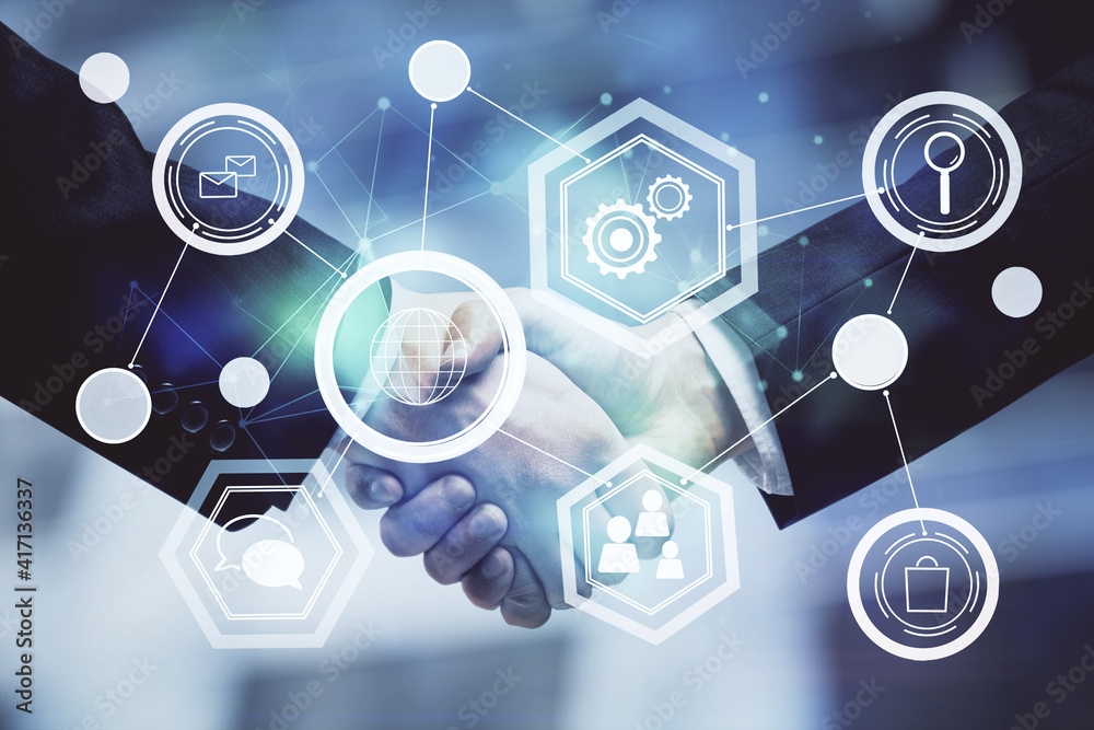 Double exposure of social network theme hologram and handshake of two men. Double exposure of social network theme hologram and handshake of two men.