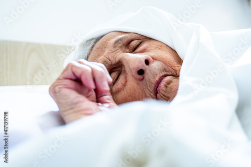 Old woman feels so sick