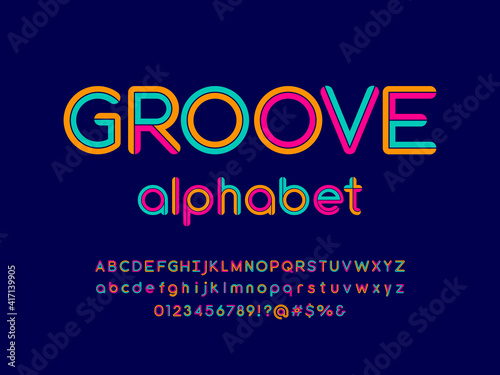 Colorful style alphabet design with uppercase, lowercase, number and symbols photo