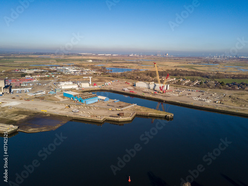 Obraz na płótnie The industrial River side of Teesside showing the river Tees and the old dock area
w salonie