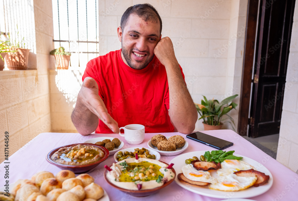 Muslim man is welcoming others to join him Muslim man is welcoming others to join him