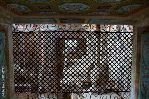 Palermo, Italy, September 03, 2017, Monastery of Santa Caterina, cloistered grates of the nuns for participation in mass  photo