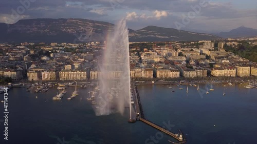 sunset time geneva cityscape lake famous fountain bay aerial panorama 4k switzerland