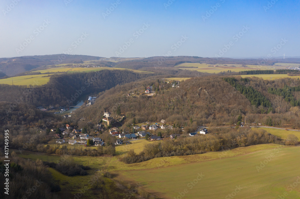 View from the bird's perspective to Balduinstein / Germany on the Lahn on a snow-free winter day 