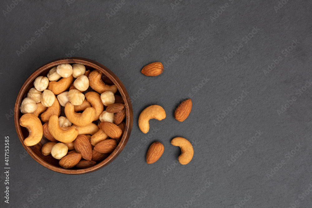 Mixed Nuts concepts black background Mixed Nuts concepts black background