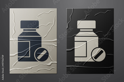 White Sedative pills icon isolated on crumpled paper background. Paper art style. Vector.