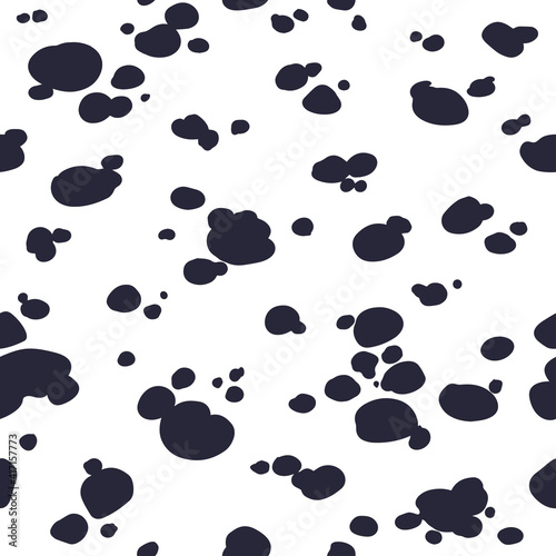 Dalmatians seamless pattern. Hand drawn animal print in black and white colors. Abstract black trend spots on a white background. Vector illustration