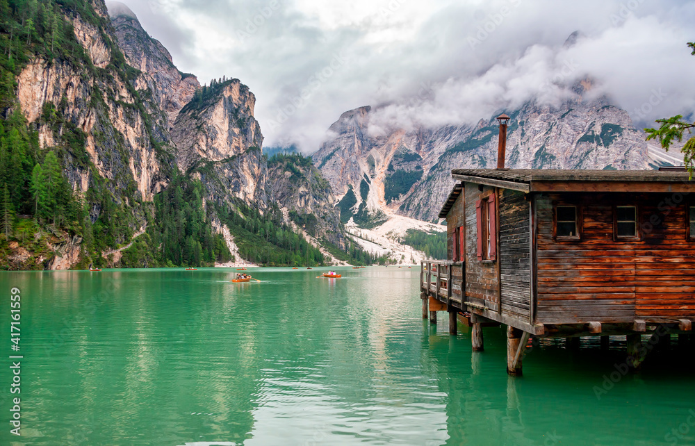 Fototapeta premium Lake Braies (Lake Prags or Pragser Wildsee) is a lake in the Prags Dolomites in South Tyrol, Italy. Hiking travel and adventure.