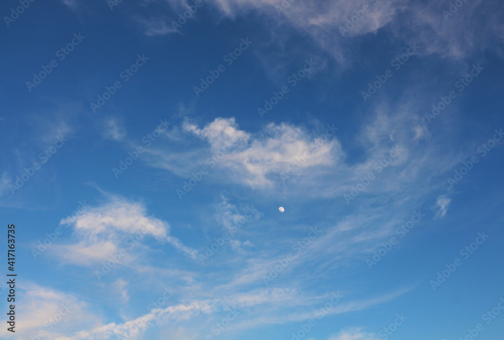 Nice sky with little moon and some small clouds