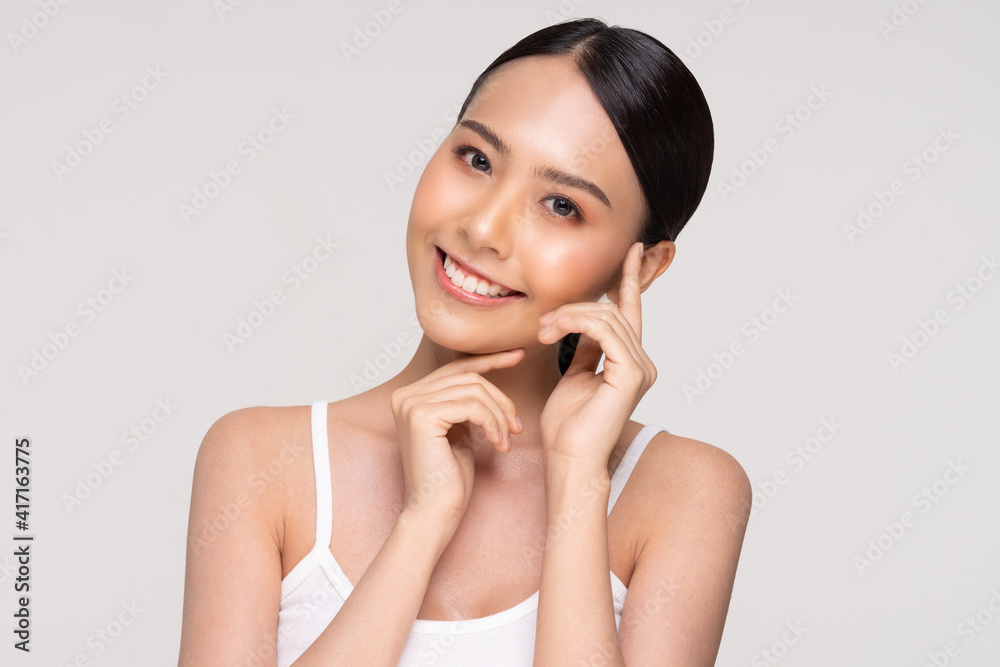 Beautiful Asian young woman touching soft cheek smile with clean and fresh skin Happiness and cheerful with positive emotional,isolated on white background,Beauty and Cosmetics Concept Beautiful Asian young woman touching soft cheek smile with clean and fresh skin Happiness and cheerful with positive emotional,isolated on white background,Beauty and Cosmetics Concept