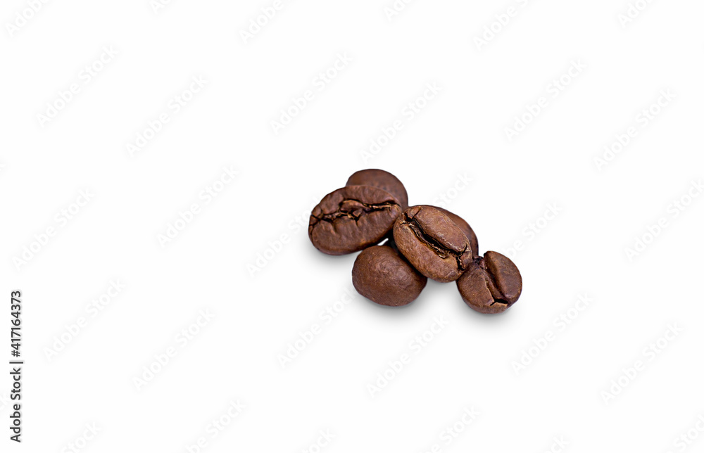 Coffee beans isolated on a white background. Coffee bean close-up. Coffee beans isolated on a white background. Coffee bean close-up.