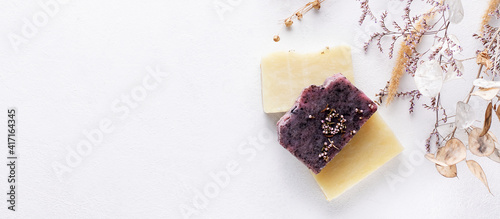 Natural handmade herbal soap on a white background with copy space. Banner.