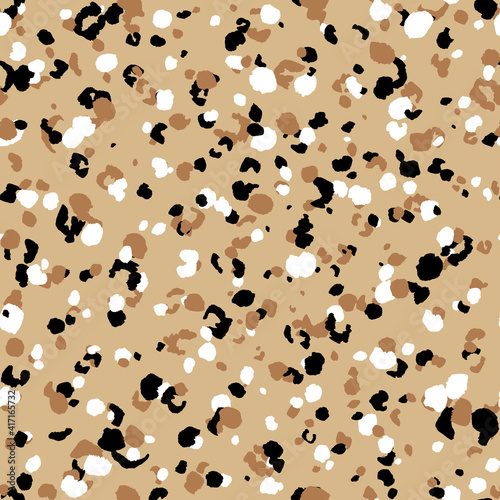 Abstract modern leopard seamless pattern. Animals trendy background. Beige and black decorative vector stock illustration for print, card, postcard, fabric, textile. Modern ornament of stylized skin © Alla