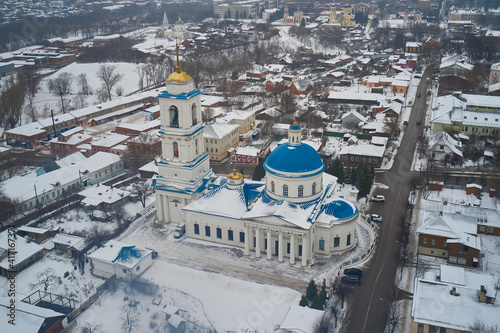 Scenic aerial view of old orthodox Nicola White Cathedral in small town Serpukhov in Moscow oblast in Russian Federation. Beautiful winter look of Nikolskiy cathedral in ancient russian town photo