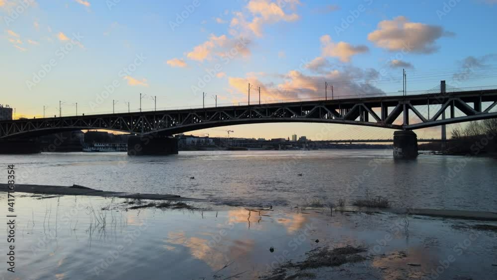 Panoramic drone view over transportation bridge in Warsaw during sunset in winter time Panoramic drone view over transportation bridge in Warsaw during sunset in winter time
