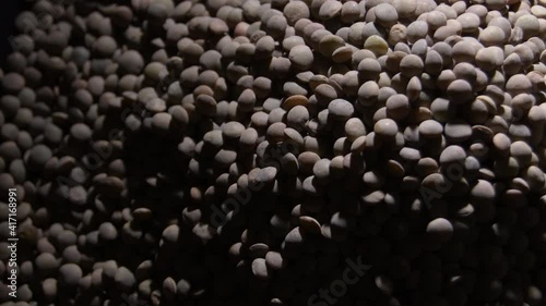 Raw lentils with a intimate light, rotation photo