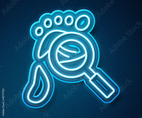 Glowing neon line Magnifying glass with footsteps icon isolated on blue background. Detective is investigating. To follow in the footsteps. Vector.