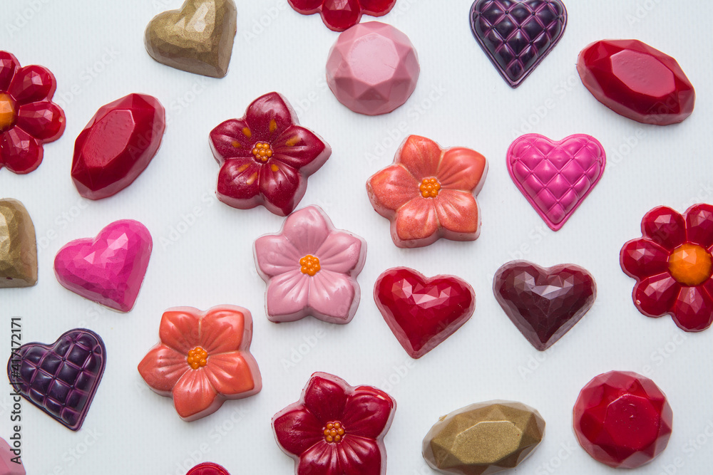 Fototapeta premium Delicious chocolate candies, close up, different colors