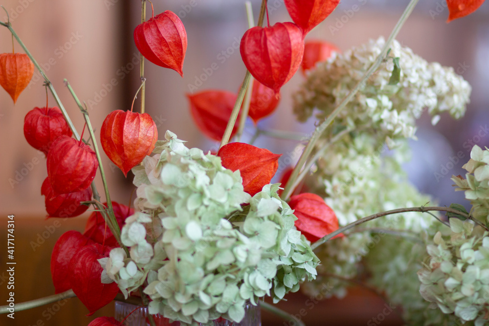 Φωτογραφία The Japanese art of ikebana dry red flowers