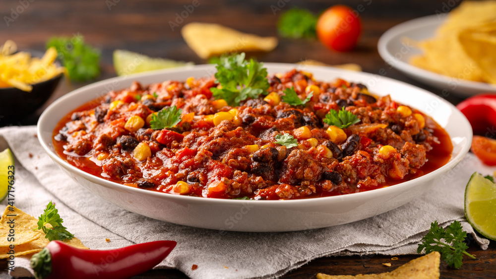 Αυτοκόλλητο Chilli con Carne with tortilla chips and cheese in white bowl