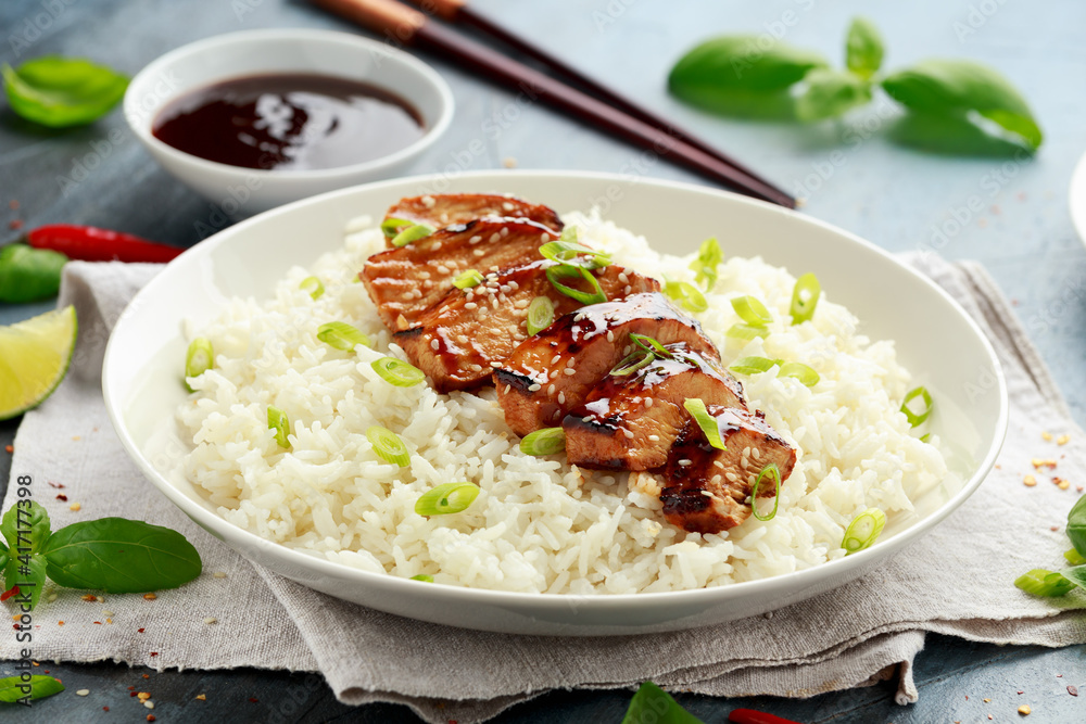 Teriyaki chicken with rice and red cabbage salad. Asian style food Teriyaki chicken with rice and red cabbage salad. Asian style food