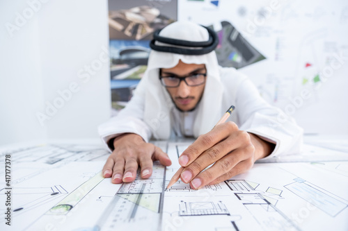 Male architect student making a sketch