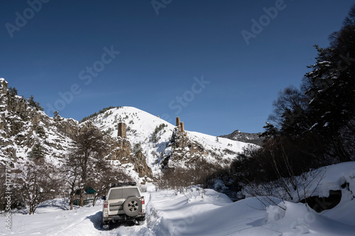 ancient towers built of stone on the slopes of mountains in Ingushetia in winter  © константин константи
