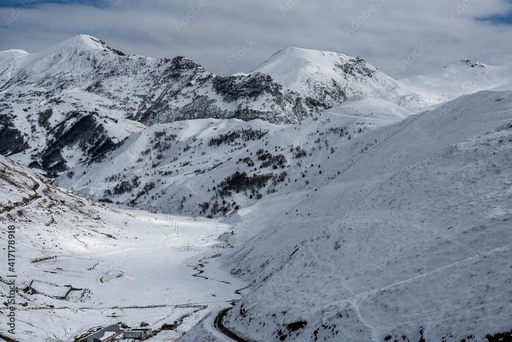 panoramic landscape of winter mountains, passes and snow-covered trees in the Caucasus panoramic landscape of winter mountains, passes and snow-covered trees in the Caucasus
