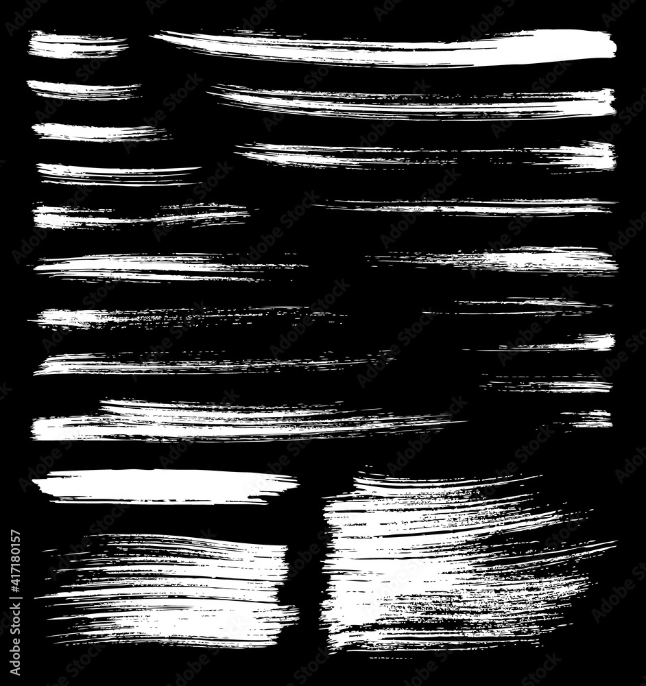 vector whitt brush splatters on black background