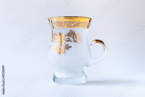 Empty tea glass isolated on white background, empty traditional tea cup 