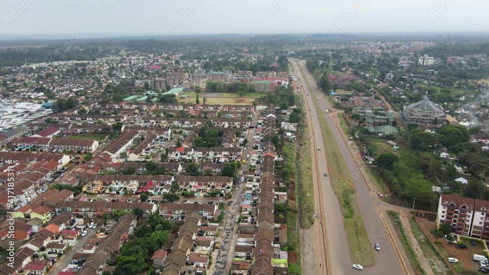 Aerial view of a modern residential buildings in Kibera built by biggest african urban slum in suburbia of Nairobi, Kenya Aerial view of a modern residential buildings in Kibera built by biggest african urban slum in suburbia of Nairobi, Kenya