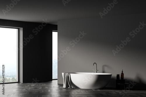Modern bathroom interior with white bathtub  shampoo table  panoramic window. Room designed in eco minimalist style. Mock up wall space. No people. 3D Rendering