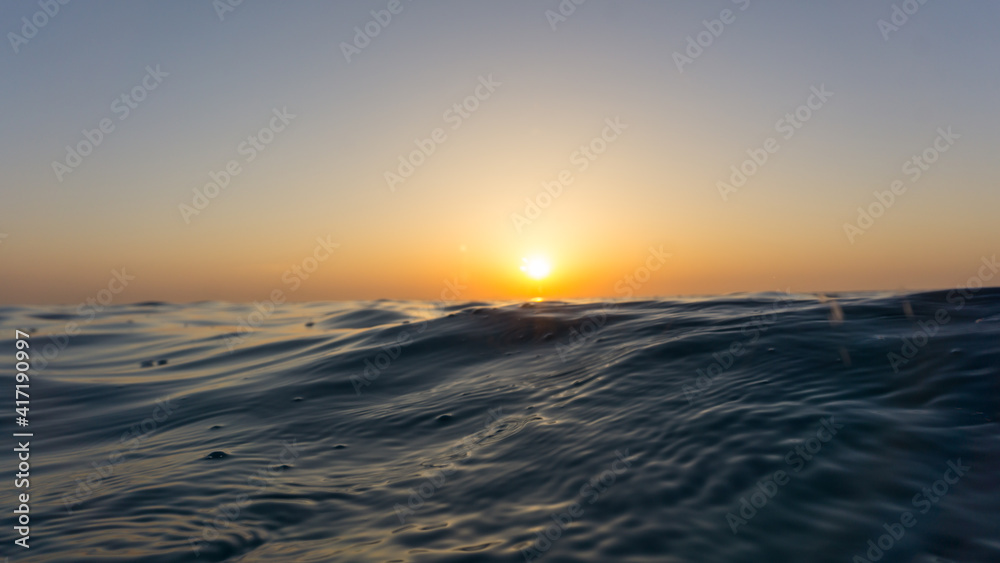 Water surface level sunset