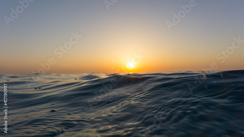 Water surface level sunset