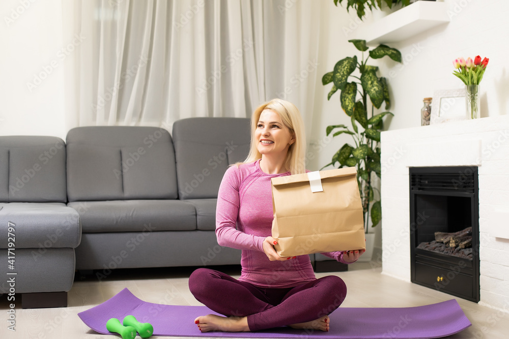 Healthy food.woman next to delivery packages with healthy food Healthy food.woman next to delivery packages with healthy food