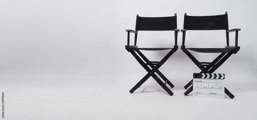 Two black director chair and clapper board use in video production or movie and cinema industry on white background.