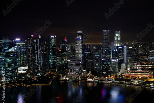 Landscape of the Singapore financial district and business building at night. Clarke Quay and the Singapore River. Singapore. 12.06.2017