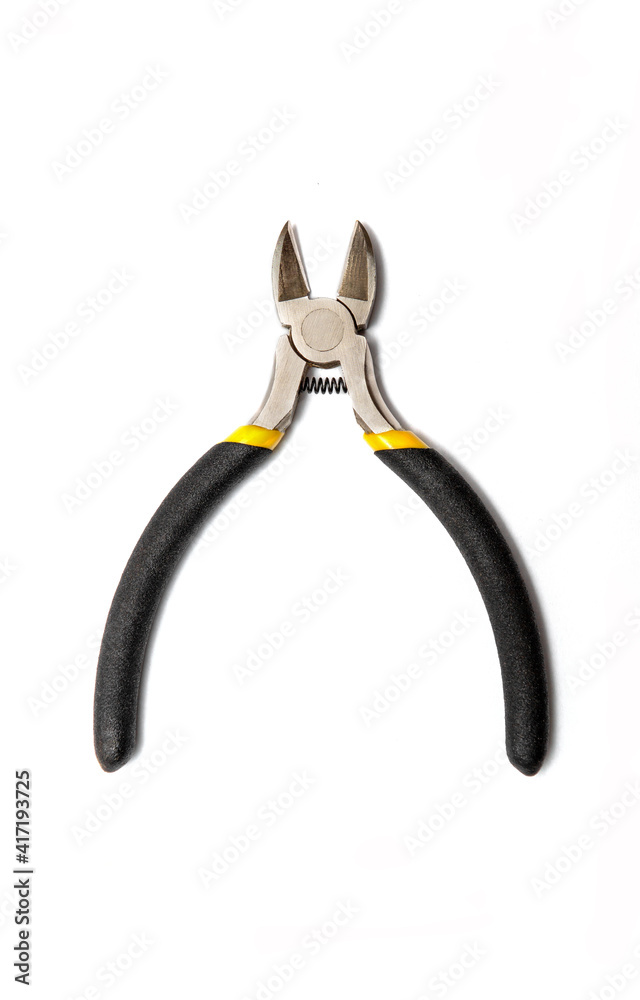 Diagonal pliers or wire cutters or diagonal cutting pliers or diagonal cutters with rubber handles for the master electrician on white background Diagonal pliers or wire cutters or diagonal cutting pliers or diagonal cutters with rubber handles for the master electrician on white background