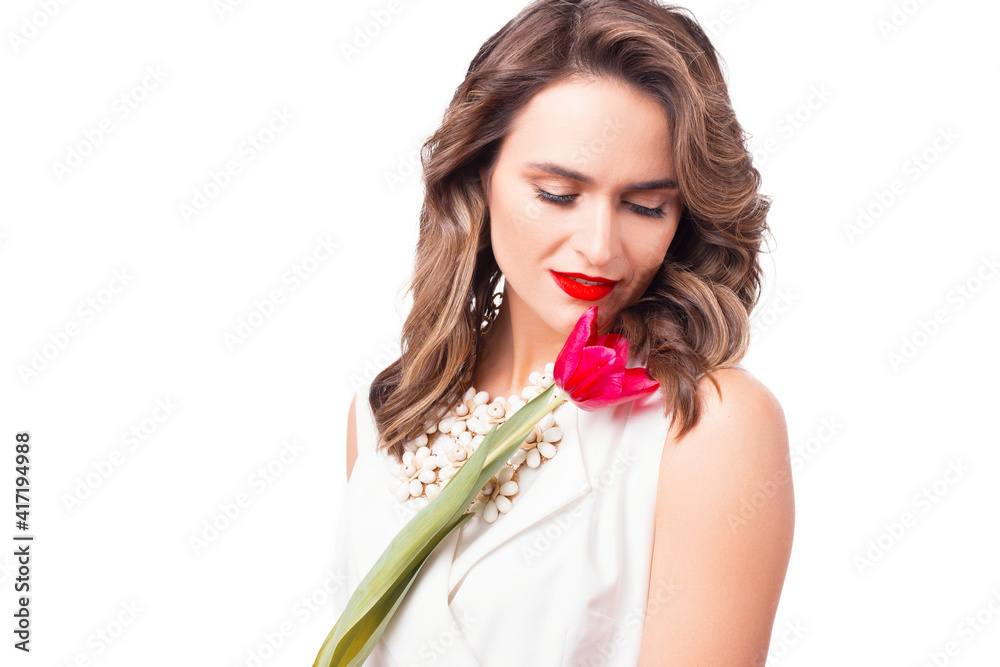 Close up photo of beautiful woman smelling pink tulip over white background. Close up photo of beautiful woman smelling pink tulip over white background.